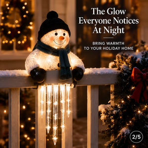 Close-up of the cheerful snowman character and warm LED icicle glow