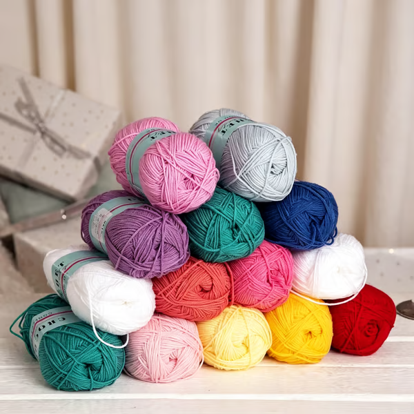 Hands crocheting with yarn taken from the advent calendar